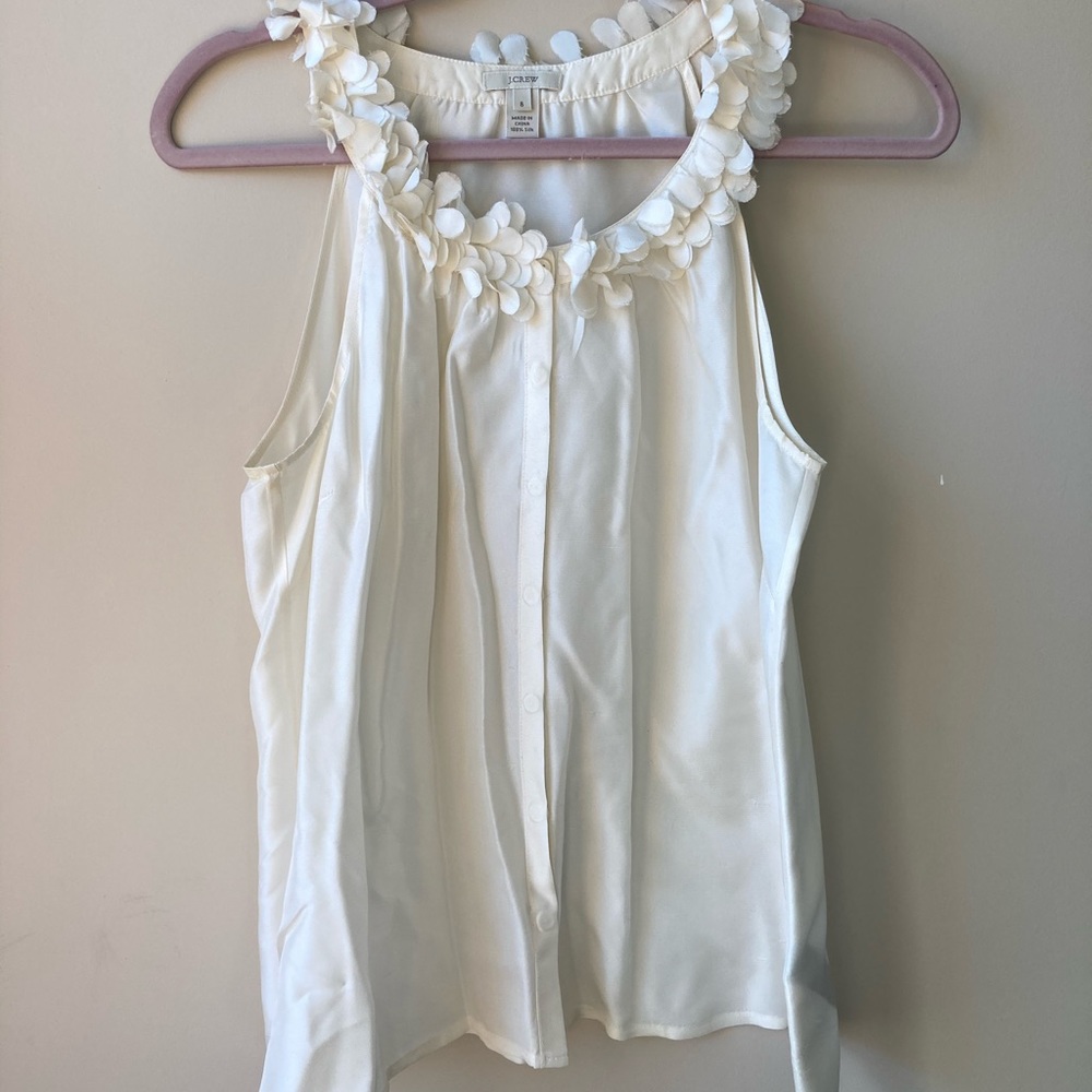 Silky white sleeveless blouse